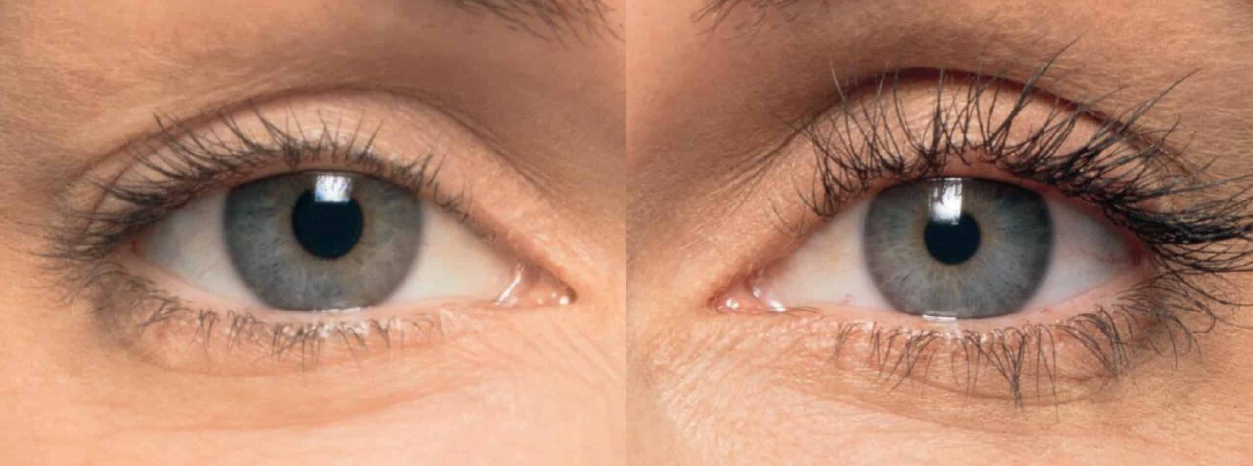 Close-up image showing two blue eyes side by side. The eye on the left has minimal makeup, while the eye on the right features noticeable mascara on the eyelashes. Both eyes appear to belong to the same person and are set against a neutral background.