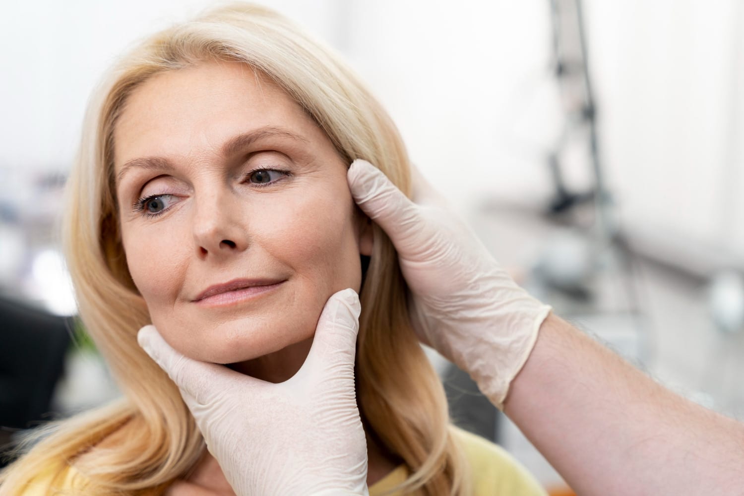 patient during a consultation about deep plane facelift at renuance