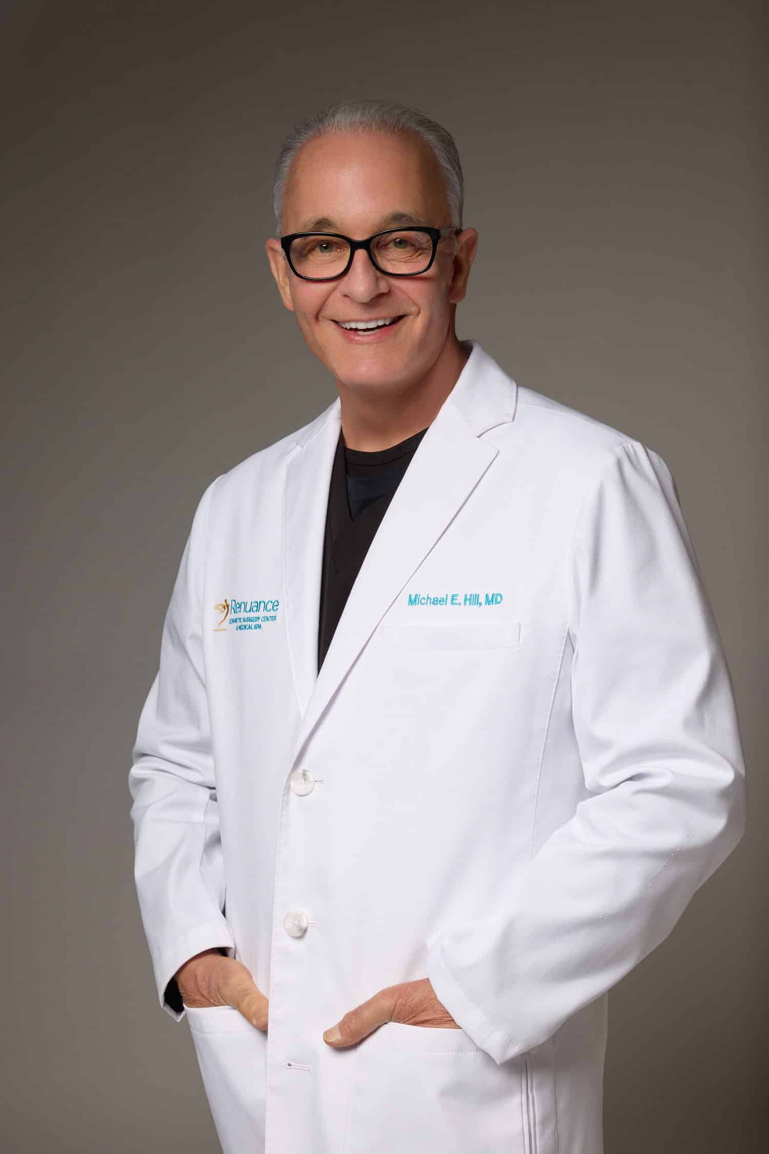 Dr. Michael E. Hill wearing medical suit