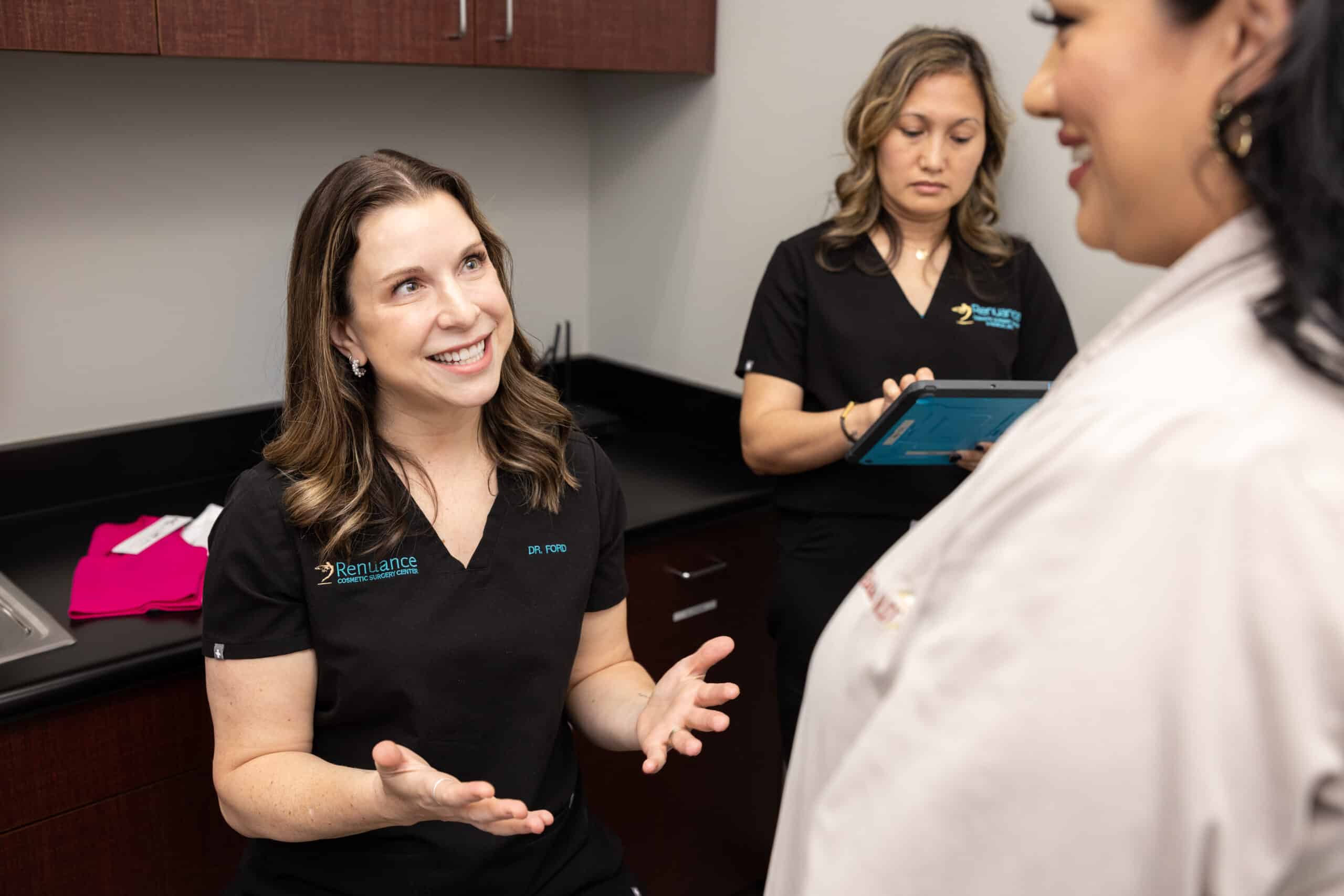 Dr. Ford breast augmentation consultation with patient